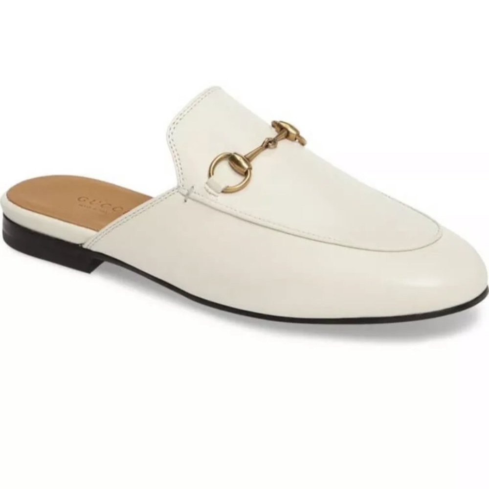 Gucci white slip on flat miles.